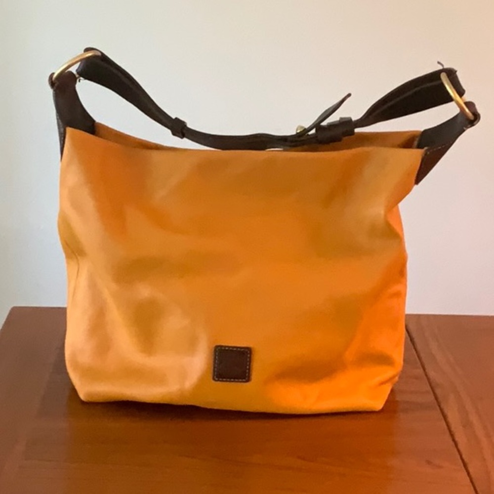 Soft pumpkin leather purse Dooney & Bourke